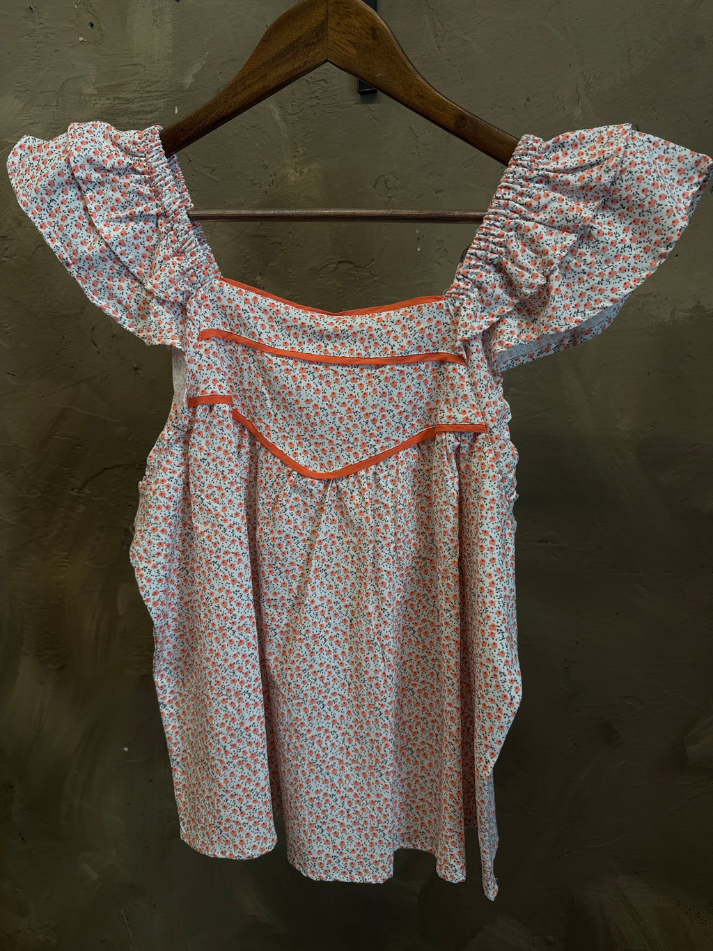 IN LOOM RUFFLE TOP