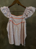 IN LOOM RUFFLE TOP